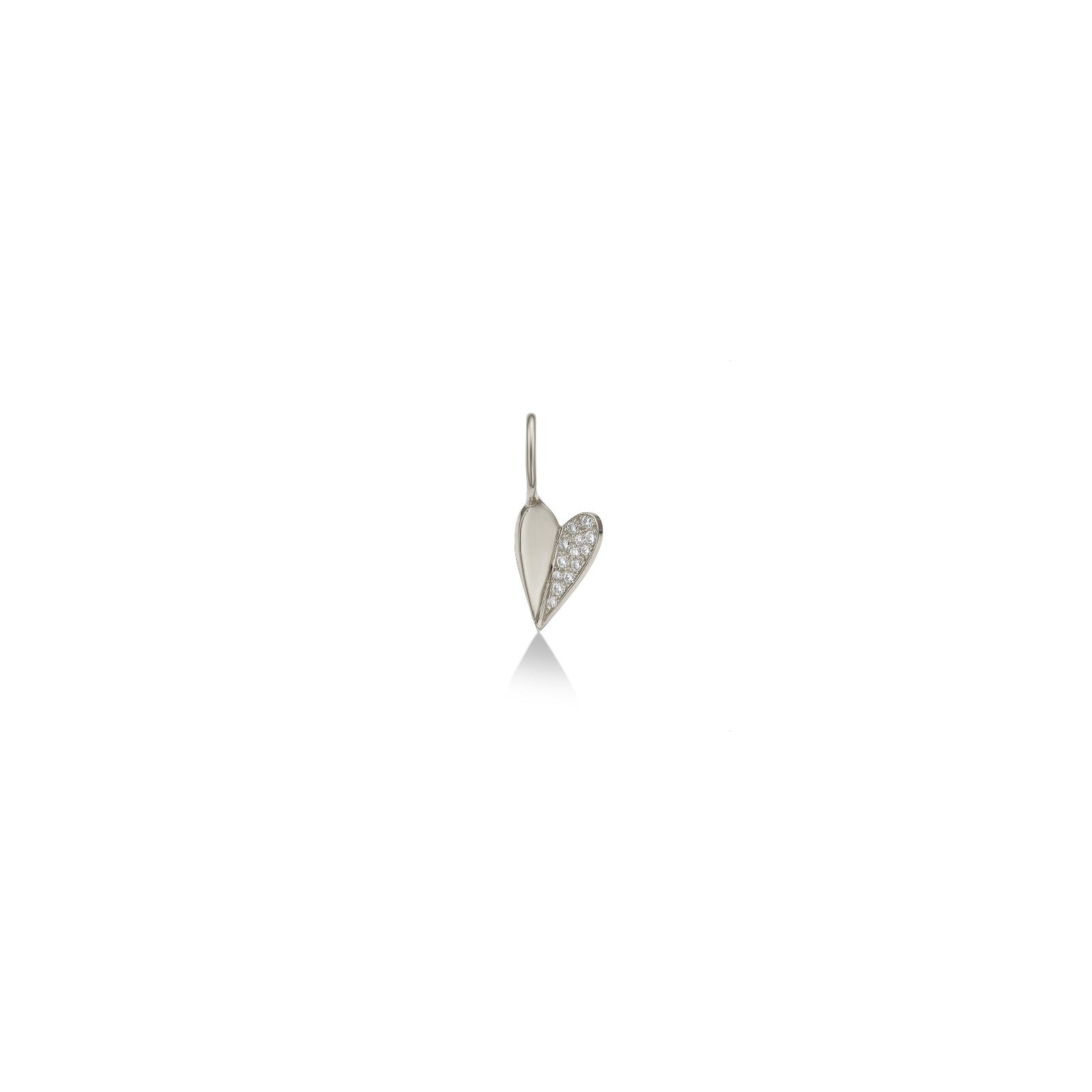 14k white gold small folded heart charm with pave diamonds on the right side.