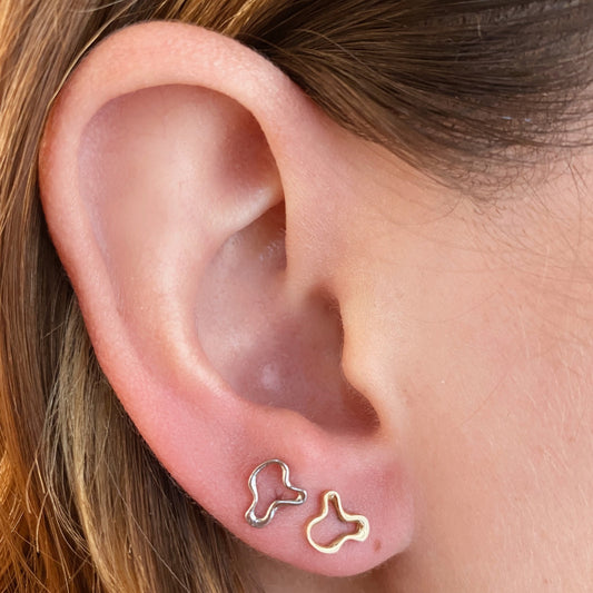 Plain Ripple Stud Earrings styled on a ear