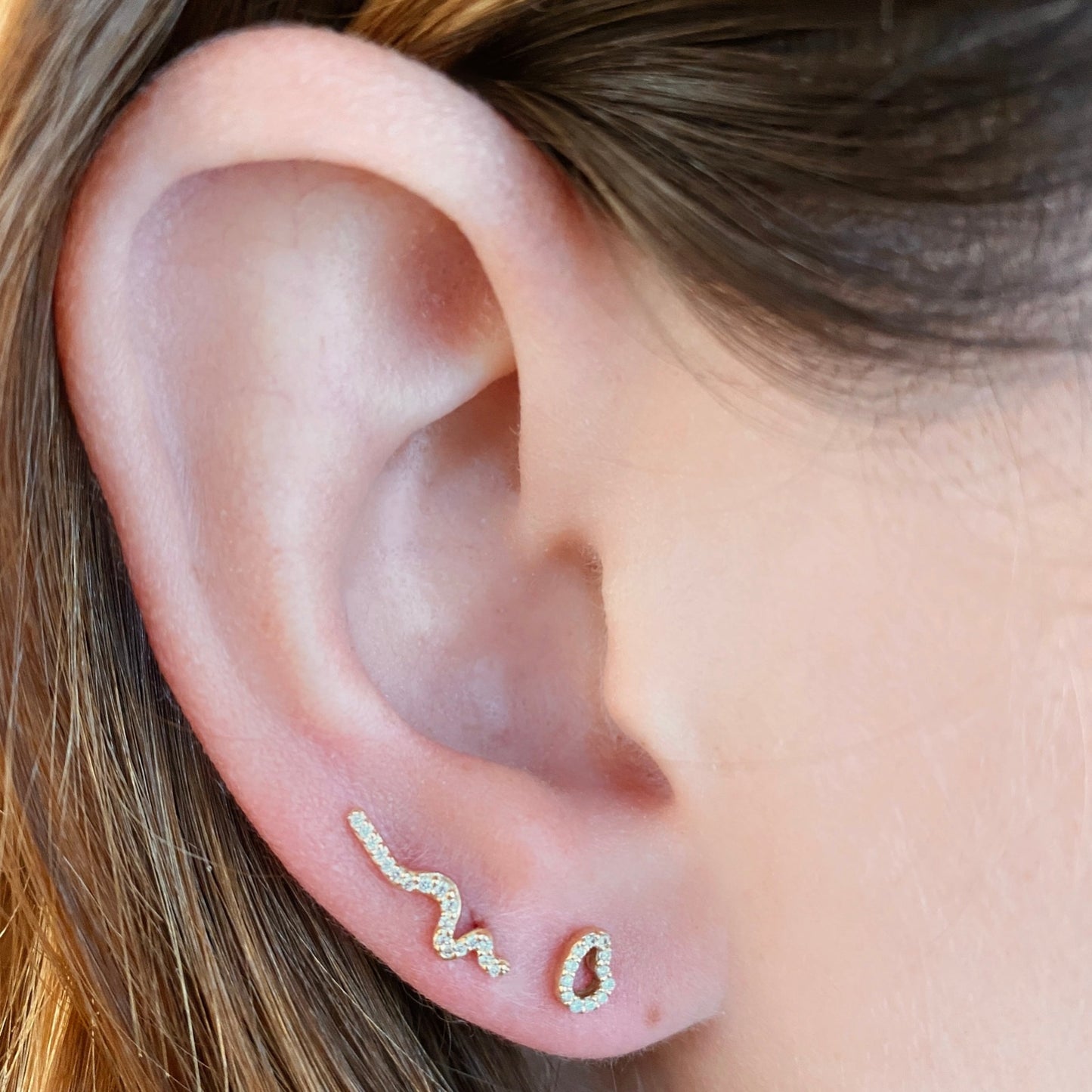 14k gold Full Pave Small Ripple Climber Earring styled on a ear