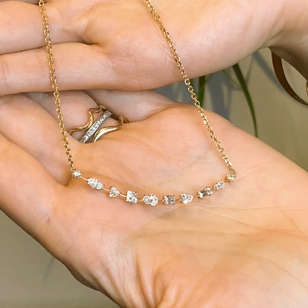 14k gold Diamond Foundry x AP Multi-Diamond Chain Necklace shimmering gif