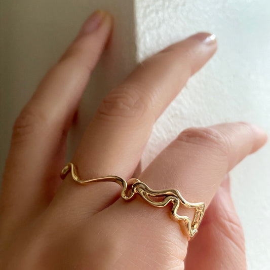 14k gold Double Finger Ripple Ring styled on a hand