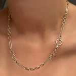 6mm Irregular Cable Chain Necklace with  round 13mm charm lock on a model's neck.