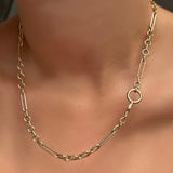 6mm Irregular Cable Chain Necklace with  round 13mm charm lock on a model's neck.