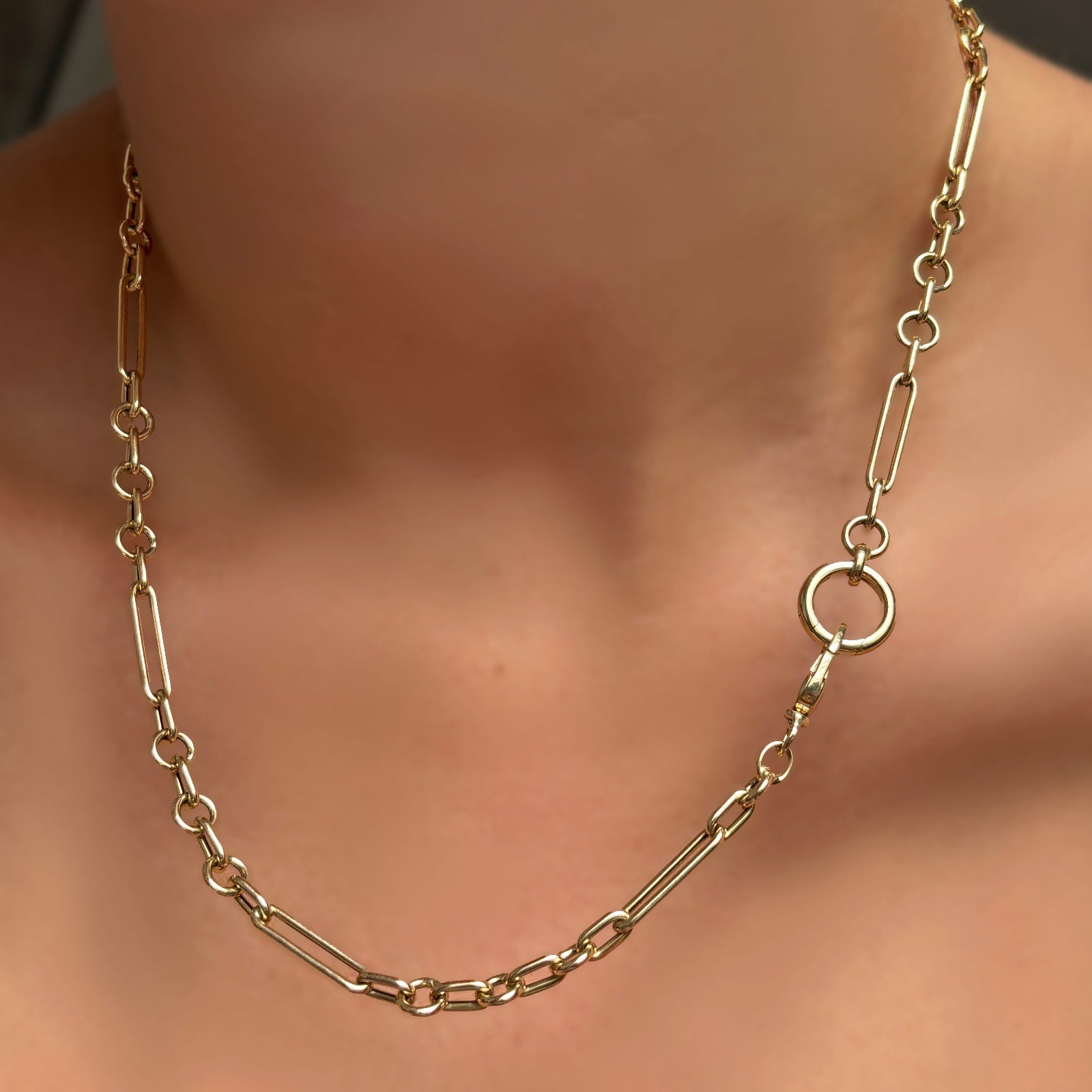 6mm Irregular Cable Chain Necklace with  round 13mm charm lock on a model's neck.