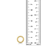 AMANDA PEARL Plain round charm lock in yellow gold next to a ruler on a white background.
