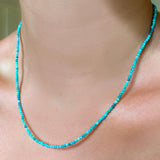 Shimmering slim gemstone beaded necklace made of 2mm faceted stones in Natural Turquoise on a gold linking lobster clasp. 