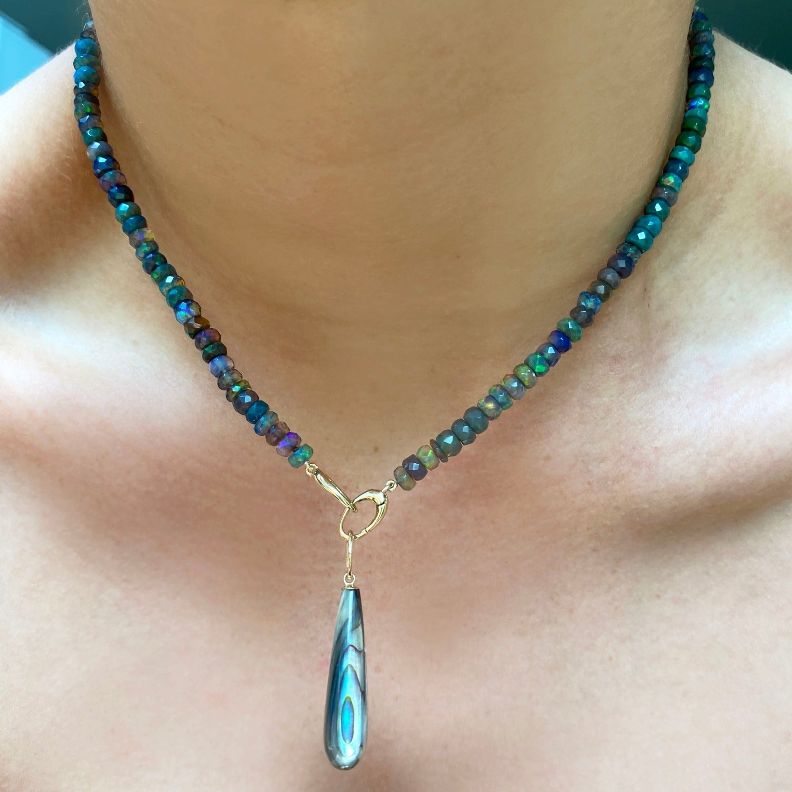 Paua Teardrop Charm styled on a faceted beaded opal necklace 