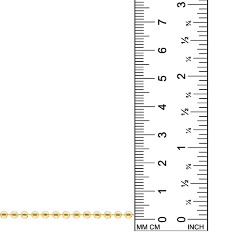 This image displays a 14k gold chain, set against a white backdrop, being compared to a ruler, demonstrating that the beads are 3mm in size.