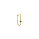 Paperclip charm lock in recycled 14k yellow gold with a round faceted cultivated emerald on a white background. 