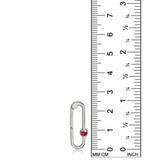 14K white gold charm lock with a ruby stone, set against a ruler for scale, on a white background.