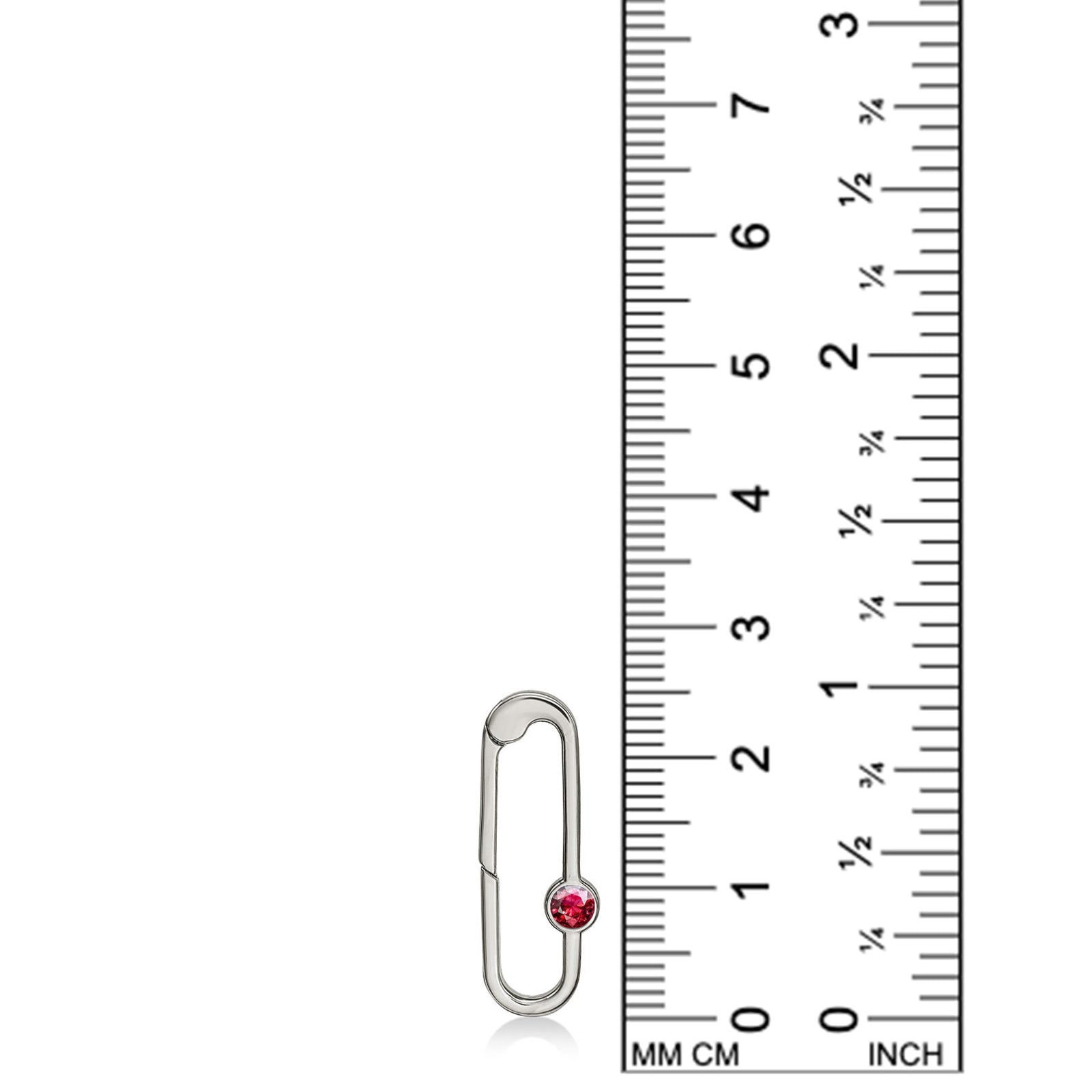 14K white gold charm lock with a ruby stone, set against a ruler for scale, on a white background.