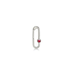 Paperclip charm lock in recycled 14k white gold with a round faceted ruby on a white background. 