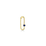 Paperclip charm lock in recycled 14k yellow gold with a round faceted cultivated sapphire on a white background. 