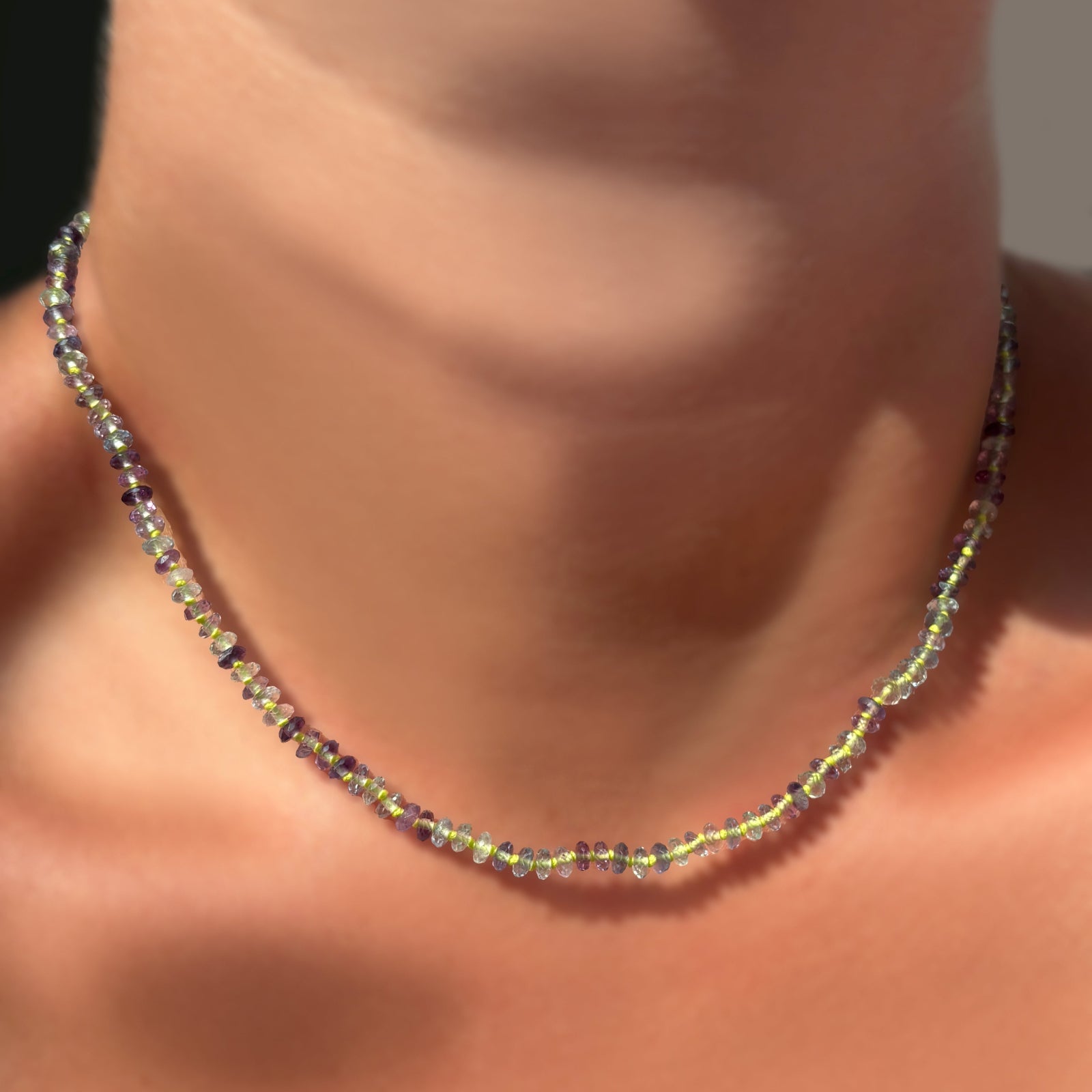 Faceted Fluorite on Neon 16" Necklace on the neck.