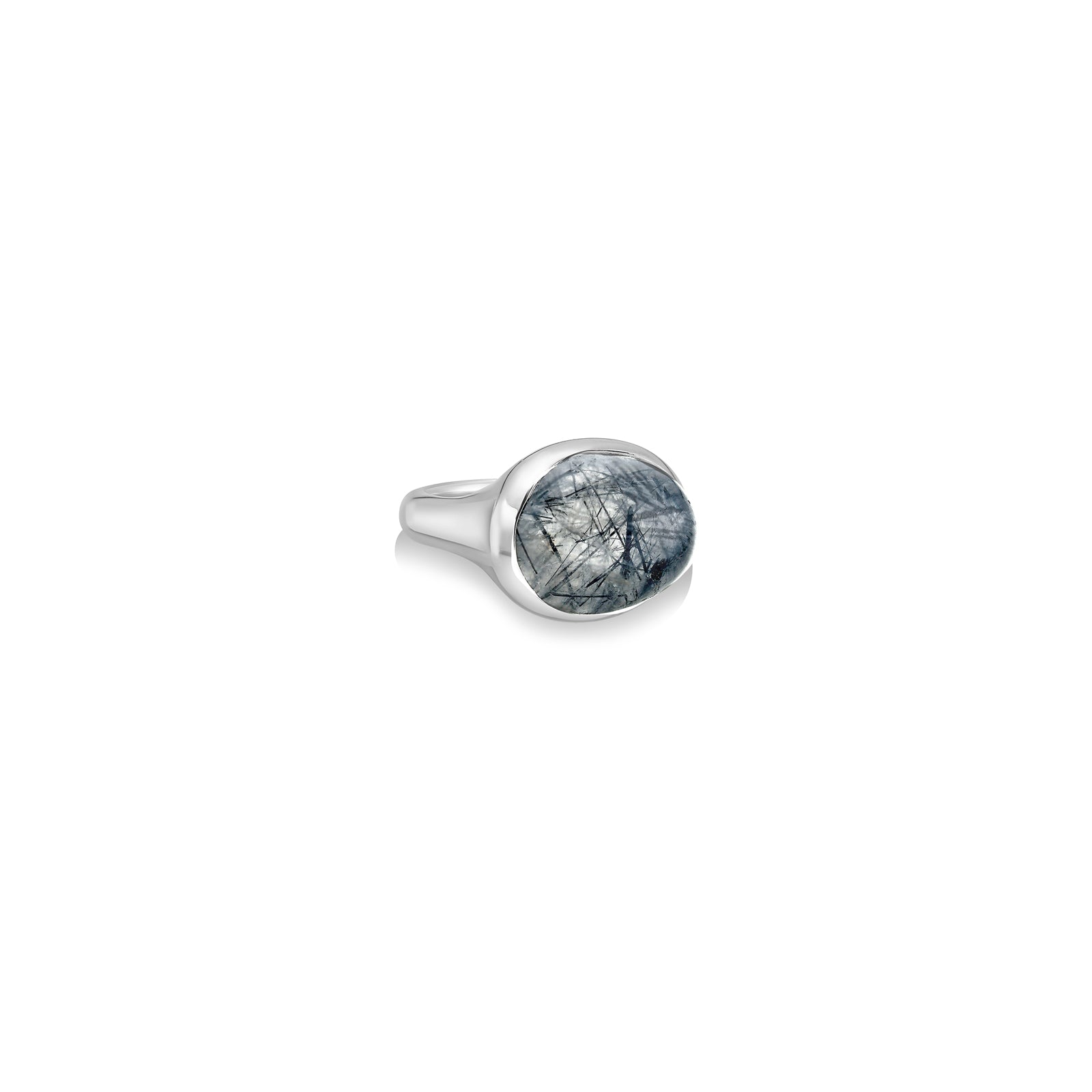 A molten pebble ring cast in recycled sterling silver with a rutilated quartz stone from AMANDA PEARL sits on a white background with drop shadow.