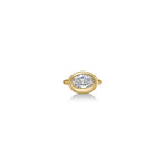 front view oval molten diamond solitaire ring in yellow gold against a white background