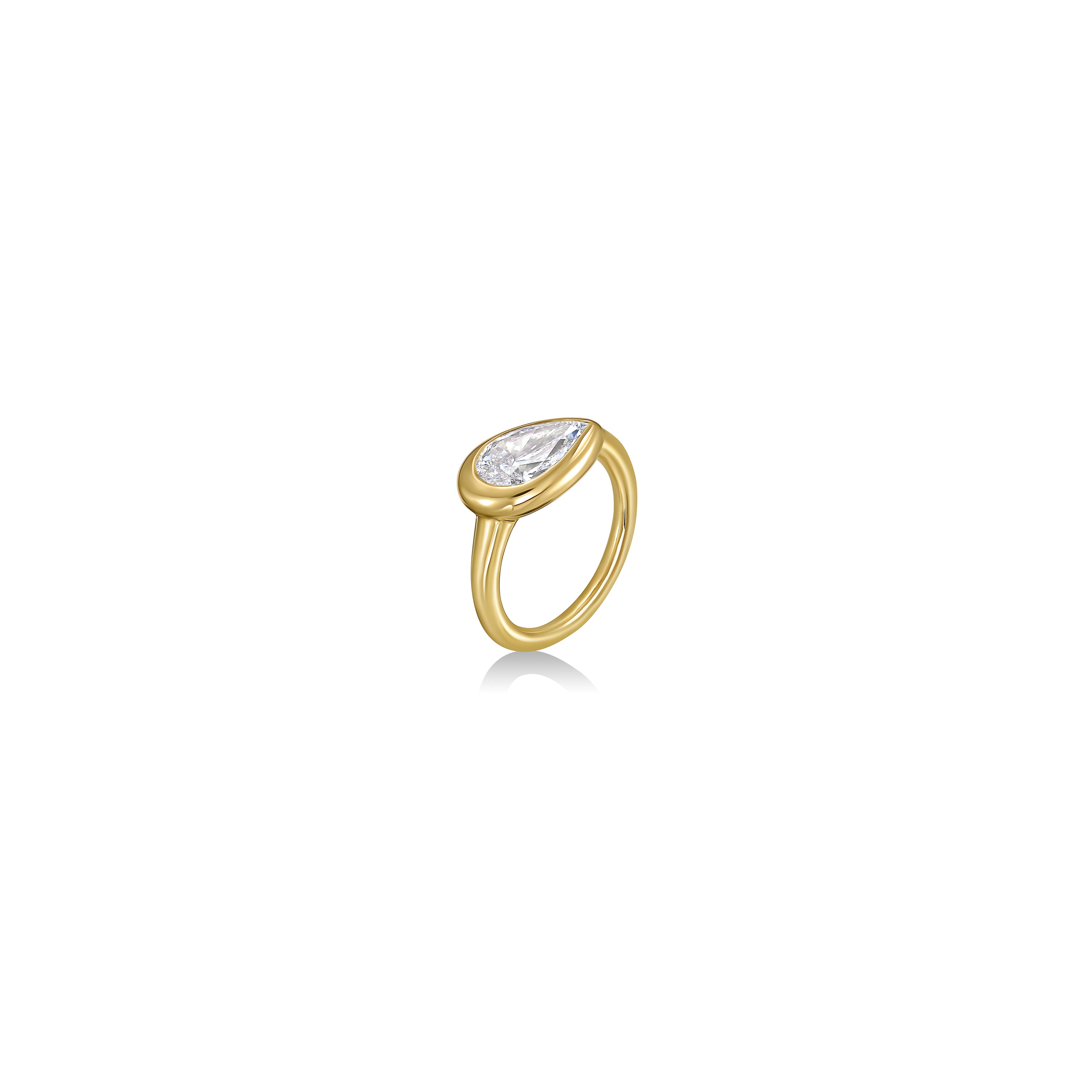 Tilt view of Molten Solitaire Ring with Pear Diamond in yellow gold against a white background