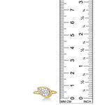 Front view of Molten Solitaire Ring with Pear Diamond in yellow gold against a ruler