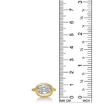 front view oval molten diamond solitaire ring in yellow gold against a ruler