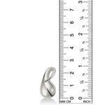 AMANDA PEARL Molten Drop Charm in recycled sterling silver on a white background next to a ruler.