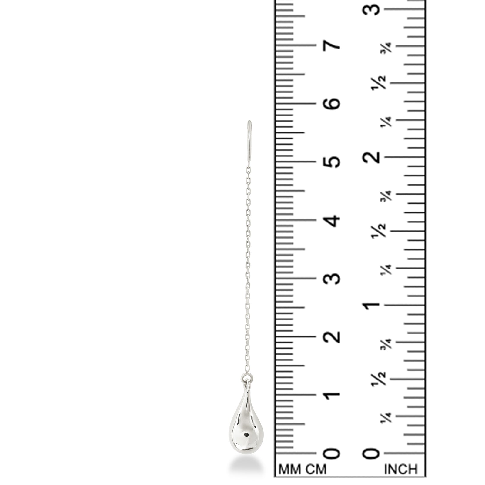 An AMANDA PEARL molten drop threader earring cast in recycled sterling silver against a ruler showing its height to be 58mm high.