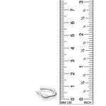AMANDA PEARL Molten Midi Ear Cuff in recycled sterling silver on a white background next to a ruler.