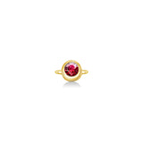 Molten solitaire ring in recycled 14k yellow gold with a round, cultivate ruby on a white background. 