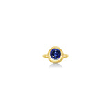Molten solitaire ring in recycled 14k yellow gold with a round, cultivate sapphire on a white background. 