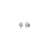 AMANDA PEARL Molten skull studs in recycled sterling silver on a white background.