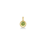 Molten Solitaire Charm in recycled 14k yellow gold with a peridot on a white background.