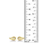 Yellow Gold Molten Studs with diamond pavé on a white background next to a ruler