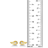 Yellow Gold Molten Studs with diamond pavé on a white background next to a ruler