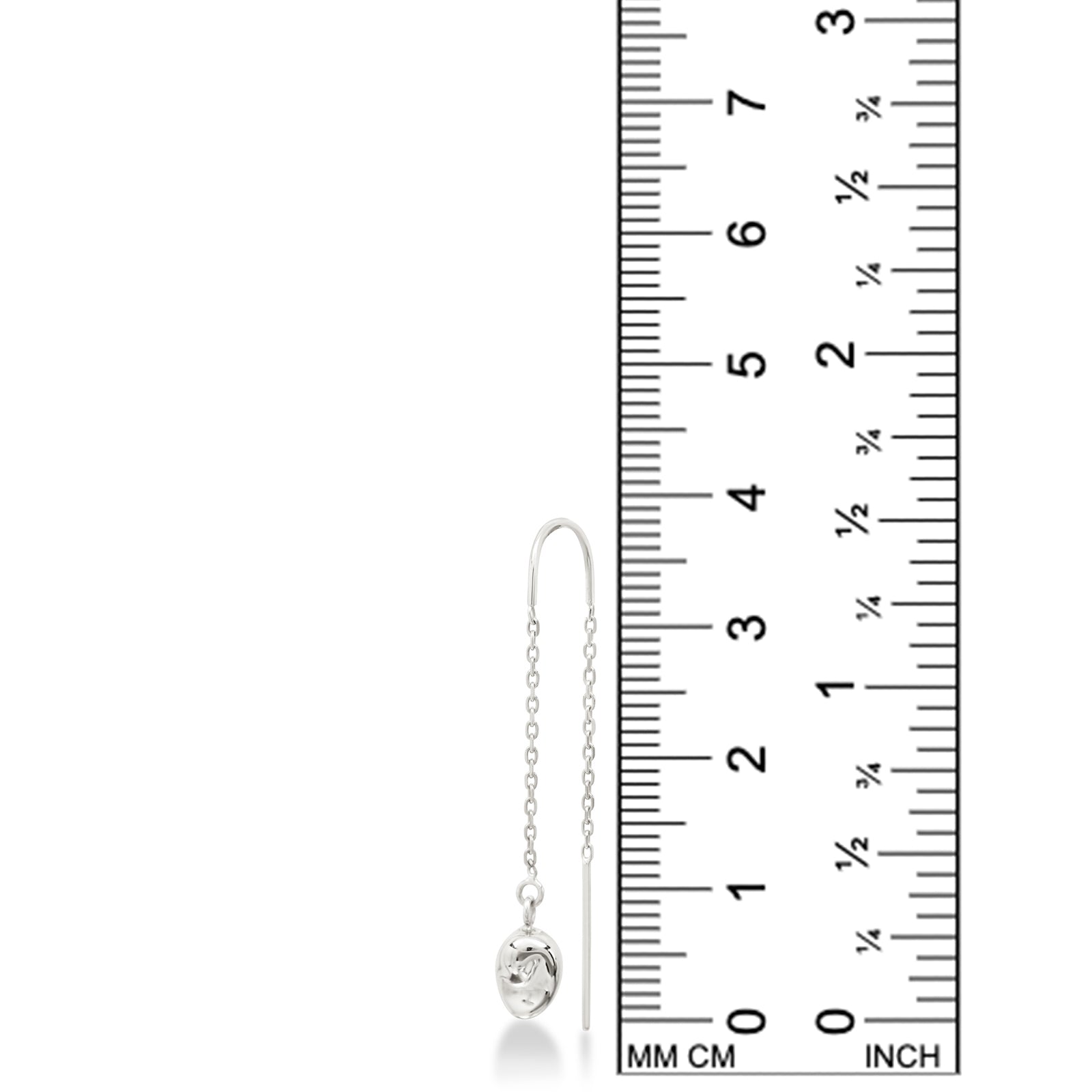 An AMANDA PEARL molten droplet threader earring cast in recycled sterling silver against a ruler showing its height to be 38mm high.
