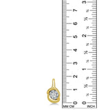 The AMANDA PEARL Molten knot charm in 14K recycled yellow gold and set with an ethical lab grown diamond. It is set against a ruler showing it's height to be 19mm.