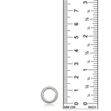 AMANDA PEARL Plain round charm lock in white gold next to a ruler on a white background.