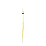 A quill spike charm cast in recycled yellow gold with a bezel set lab grown emerald, on a white background. 