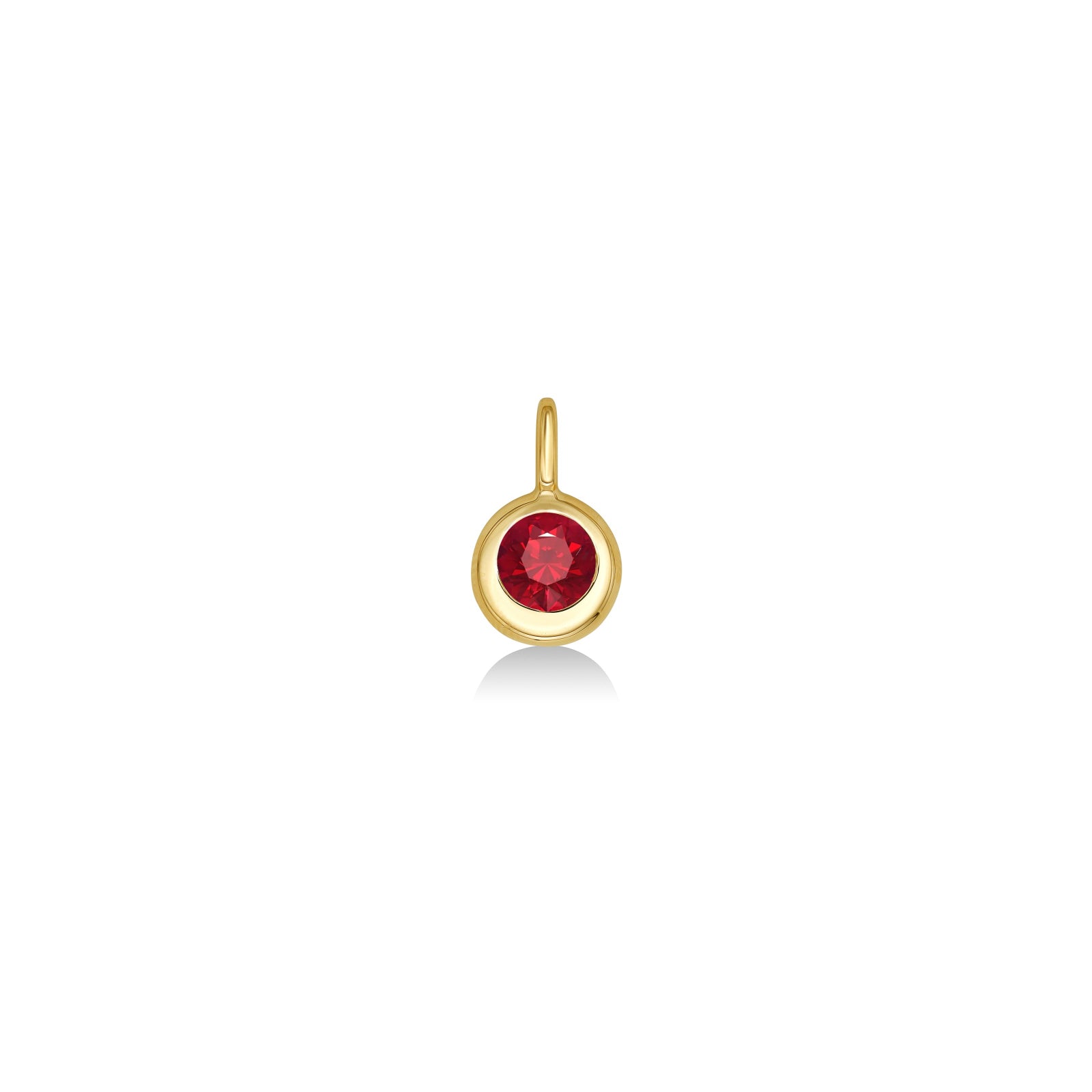 A 14K molten round solitaire charm bezel set with an ethical lab grown round Ruby stone, set against a white background.