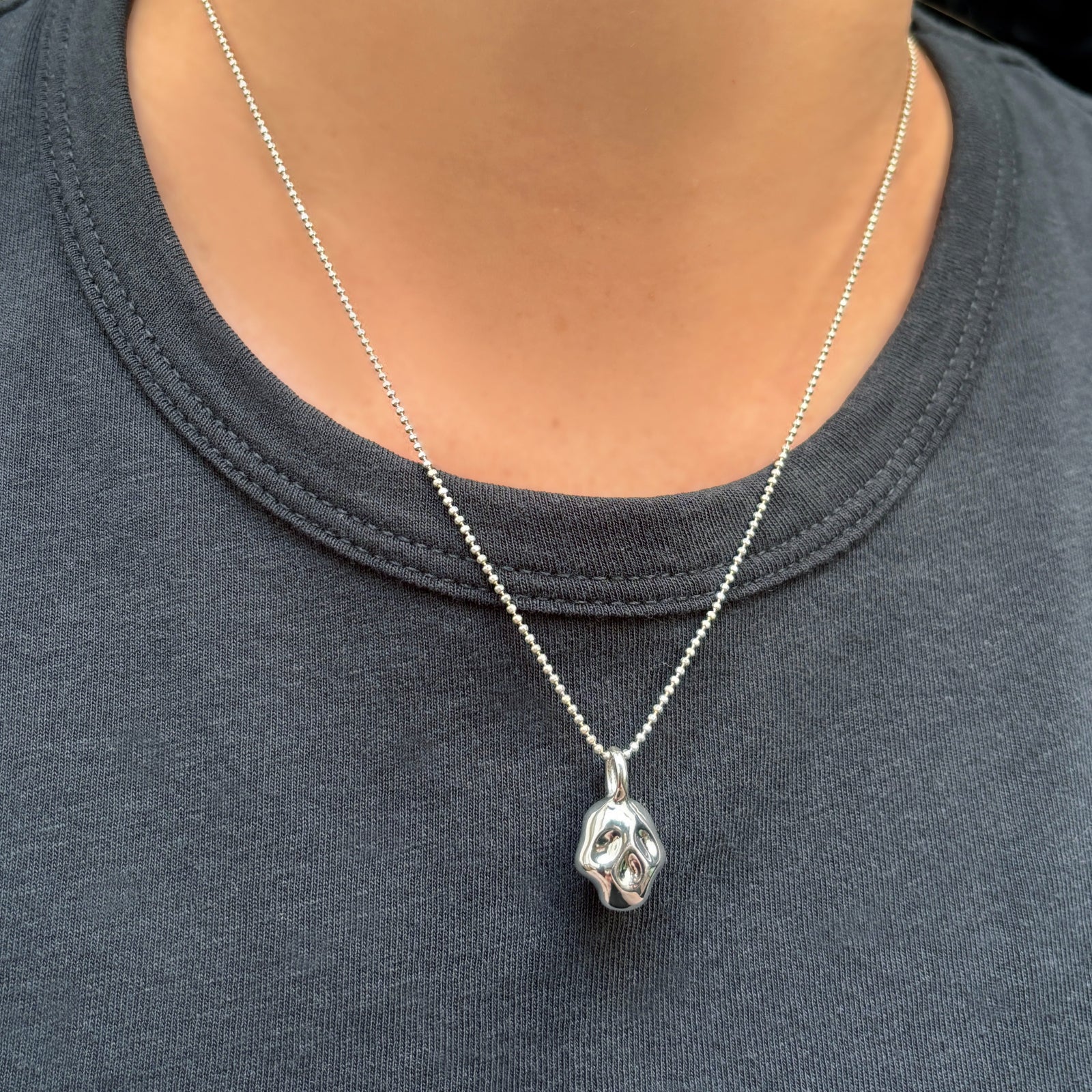 AMANDA PEARL Diamond Cut Bead Chain and Molten Skull Charm in recycled sterling silver.