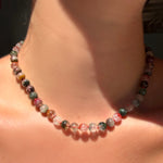 Phantom Quartz Necklace on carnelian thread on a model's neck.