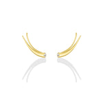 A pair of 14k recycled yellow gold climber earrings with a quill spike shape and a bezel set round pearl on a white background
