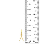 A 14k gold letter "A" huggie earring is positioned next to a ruler, demonstrating that its height is 2.2cm. It is meant to hang from your earlobe via a small hoop, but here it is pictured in front of a simple white background.