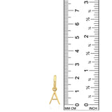 A 14k gold letter "A" huggie earring is positioned next to a ruler, demonstrating that its height is 2.2cm. It is meant to hang from your earlobe via a small hoop, but here it is pictured in front of a simple white background.