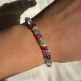 Night fever faceted sapphire bracelet on a model's wrist.