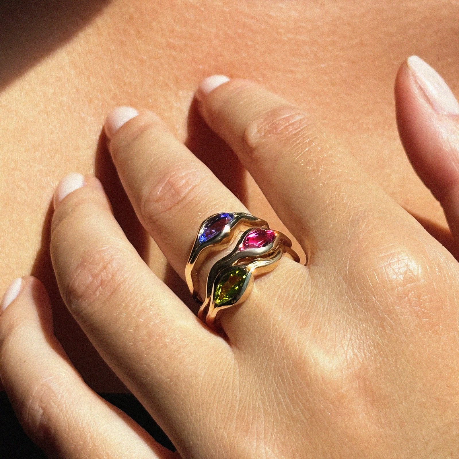 14K Recycled Gold Ripple Ring with Green Tourmaline Marquise stacked with Blue Tourmaline and Pink Tourmaline 

Fashion, Fashion Photography, Jewelry Design, Fashion Styles, Trends, Trendy, Lab Grown Diamonds, Rings, Fine Jewelry