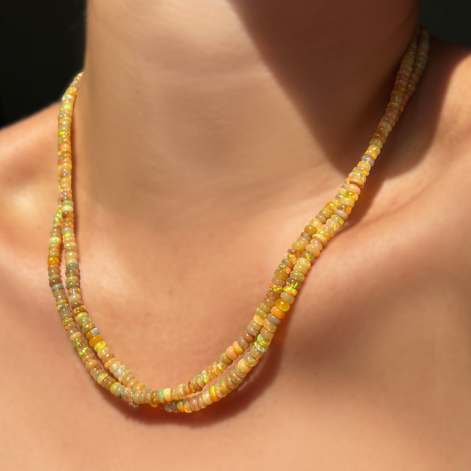 golden fall opals layered on a model's neck