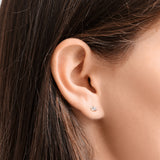 An AMANDA PEARL recycled 14k gold and ethical marquise cut diamond elements stud.