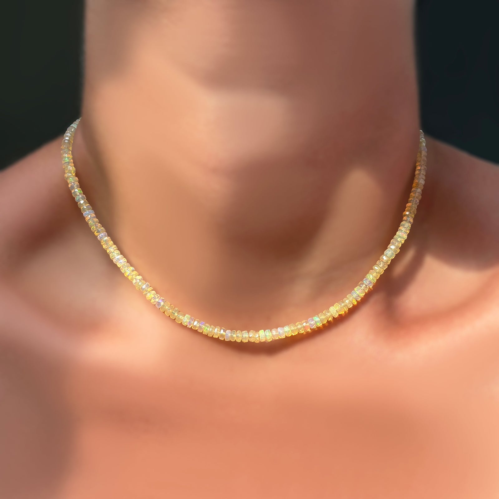 Pink Champagne Opal Necklace on a model's neck
