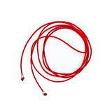 AMANDA PEARL red cord necklace with a small silver bead on each end on a white background