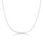 Shimmering slim gemstone beaded necklace made of 2mm faceted stones in moonstone on a gold linking lobster clasp on a white background