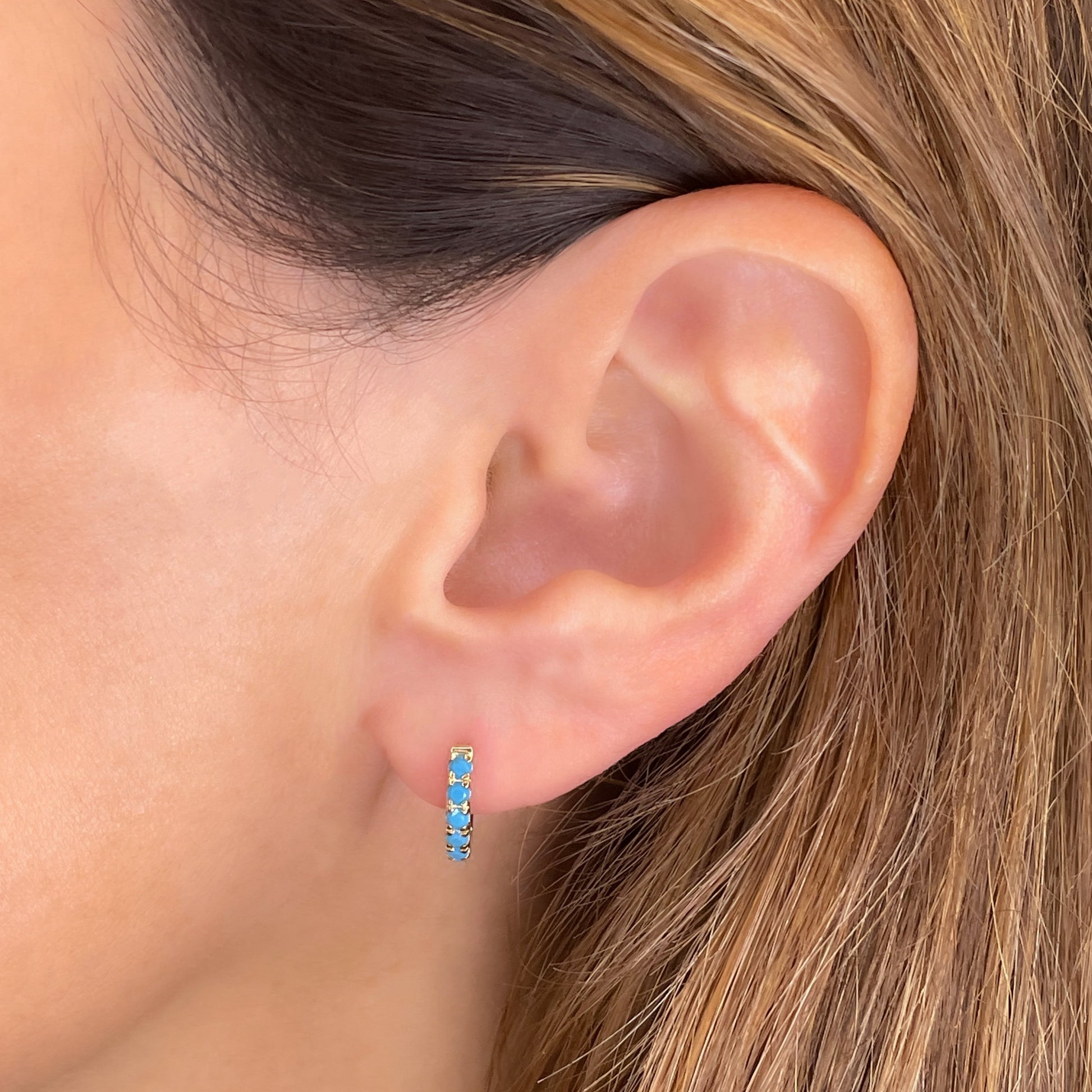 14k gold 13mm Turquoise Pavé Hoop styled on a ear